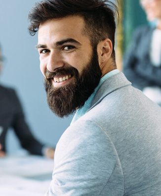 portrait-of-young-male-architect-on-meeting-PAHNTXG1.jpg